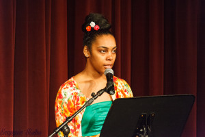 Adrienne reading poem about her mother Delores.