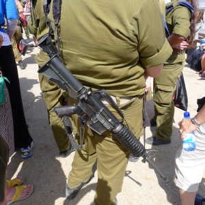 Young Israeli soldiers carry these guns 24-7, like our kids do their iPhones.